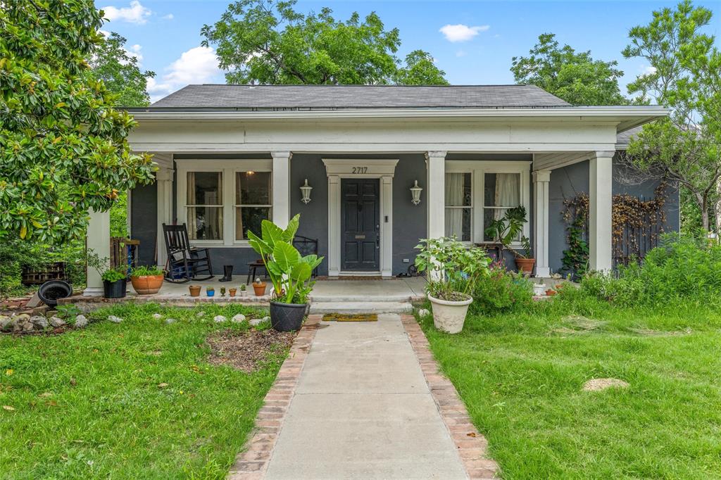 2717 Colcord Avenue Waco, TX 76707 - Photo 2 of 34 a view of a house with potted plants and a bench