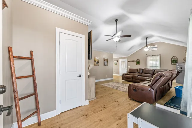 a kitchen with stainless steel appliances granite countertop a refrigerator stove top oven a sink and dishwasher