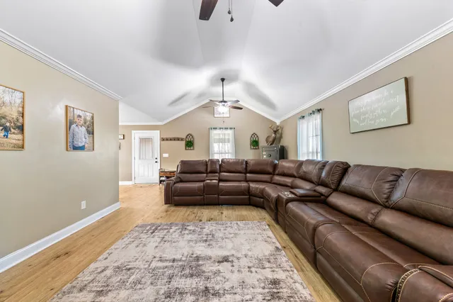 a kitchen with stainless steel appliances granite countertop a stove and a refrigerator