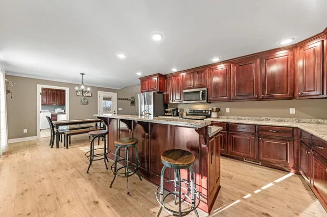 a utility room with closet dryer and washer
