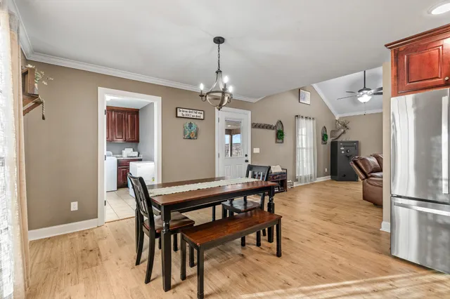 a picture of a wall with a white wall and a white refrigerator