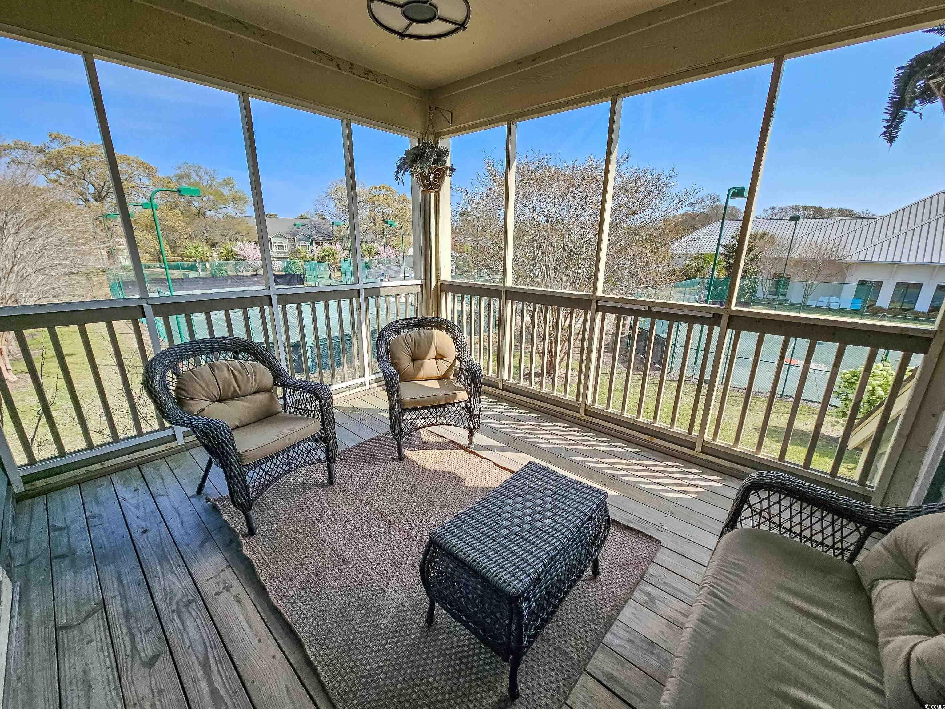 800 Castleford Circle, Unit 1E Myrtle Beach, SC 29572 - Photo 2 of 40 View of sunroom / solarium