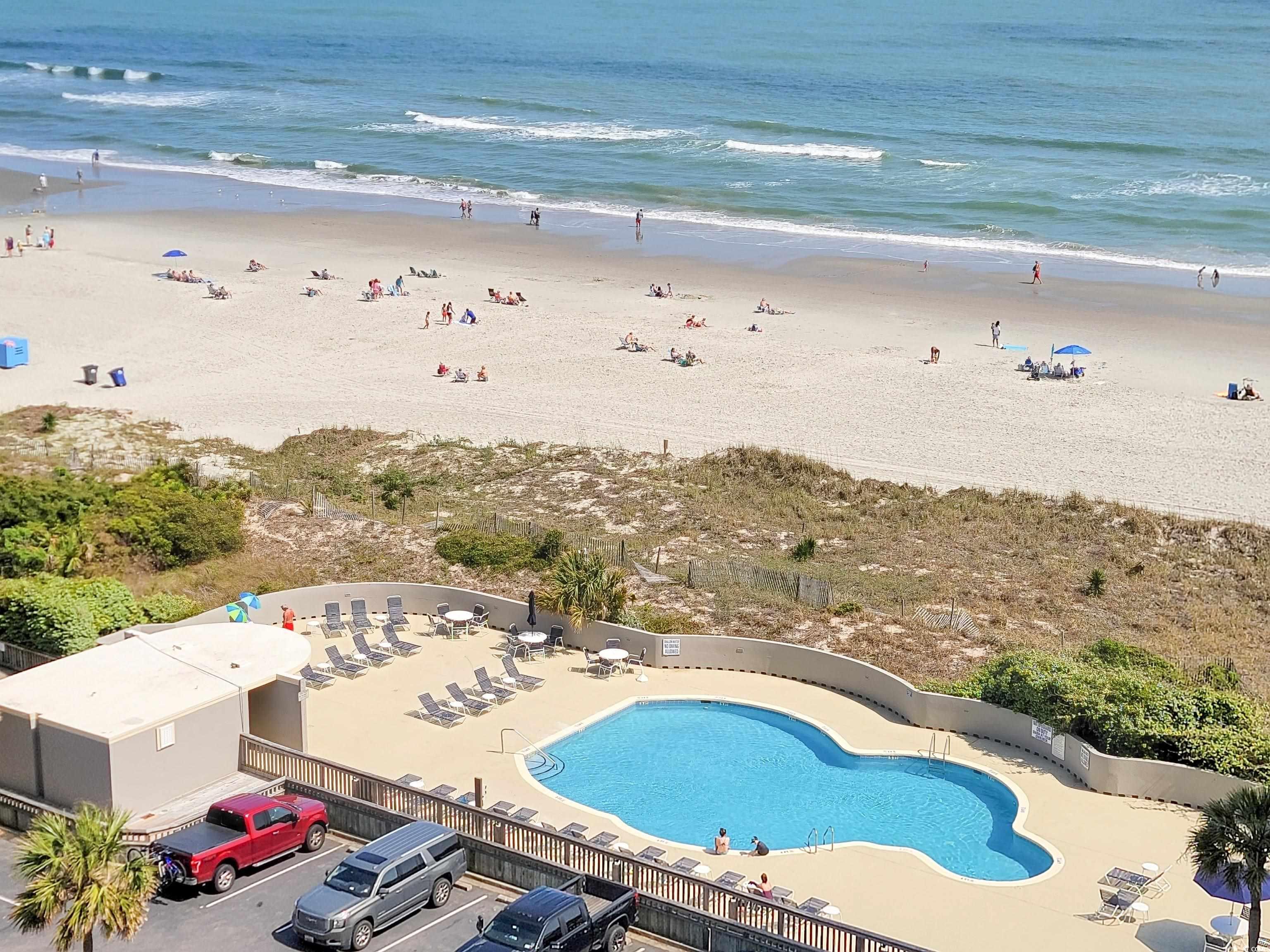800 Castleford Circle, Unit 1E Myrtle Beach, SC 29572 - Photo 38 of 40 Birds eye view of property featuring a view of the beach and a water view