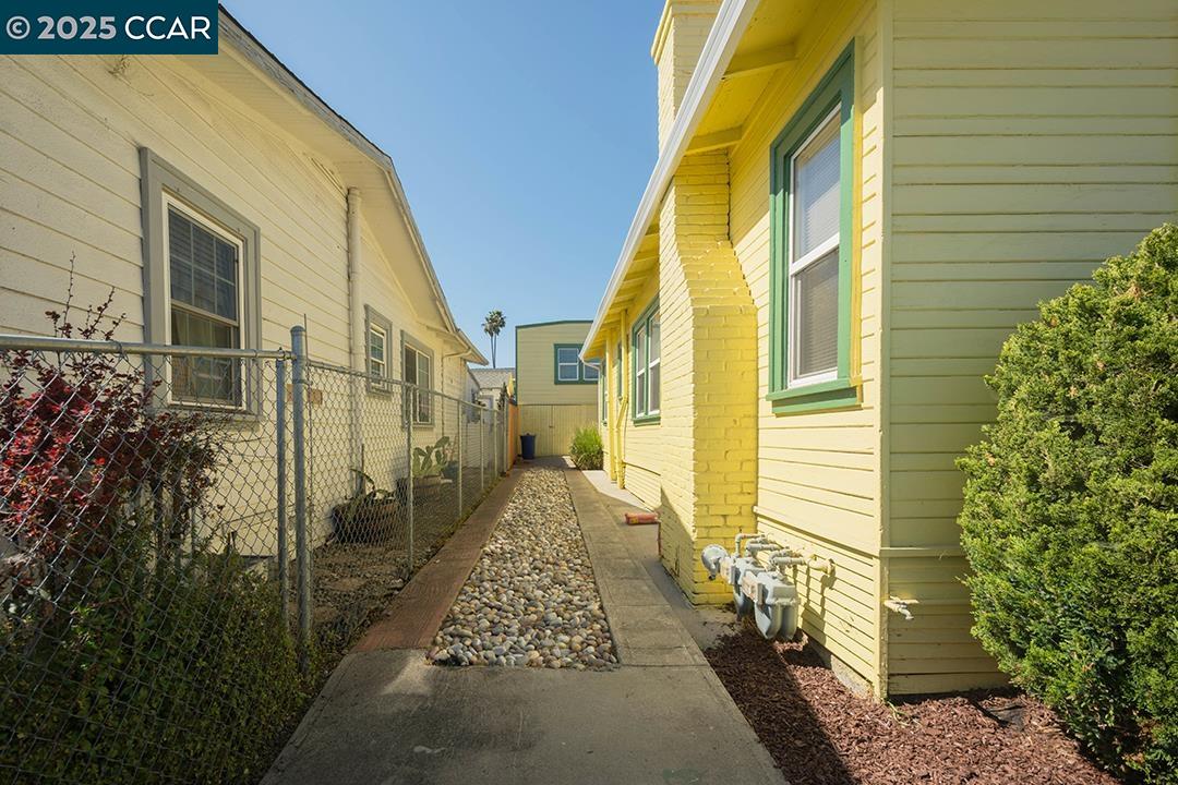 Melrose Heights Oakland, CA 94621 - Photo 23 of 34 a view of a brick house with a large windows