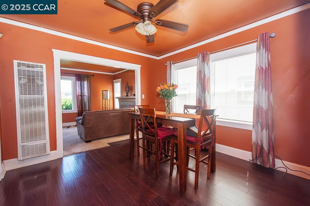 Melrose Heights Oakland, CA 94621 - Photo 9 of 34 a view of a dining room with furniture window and wooden floor