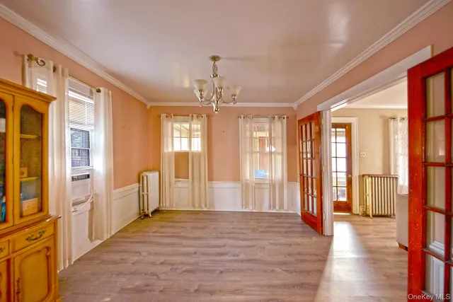 a view of an entryway with livingroom