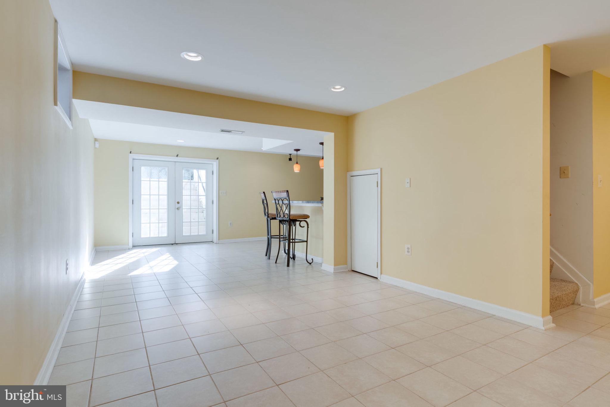 8111 Ridge Creek Way Springfield, VA 22153 - Photo 28 of 43 Fully Finished Lower Level w/Walk-Out Stairs