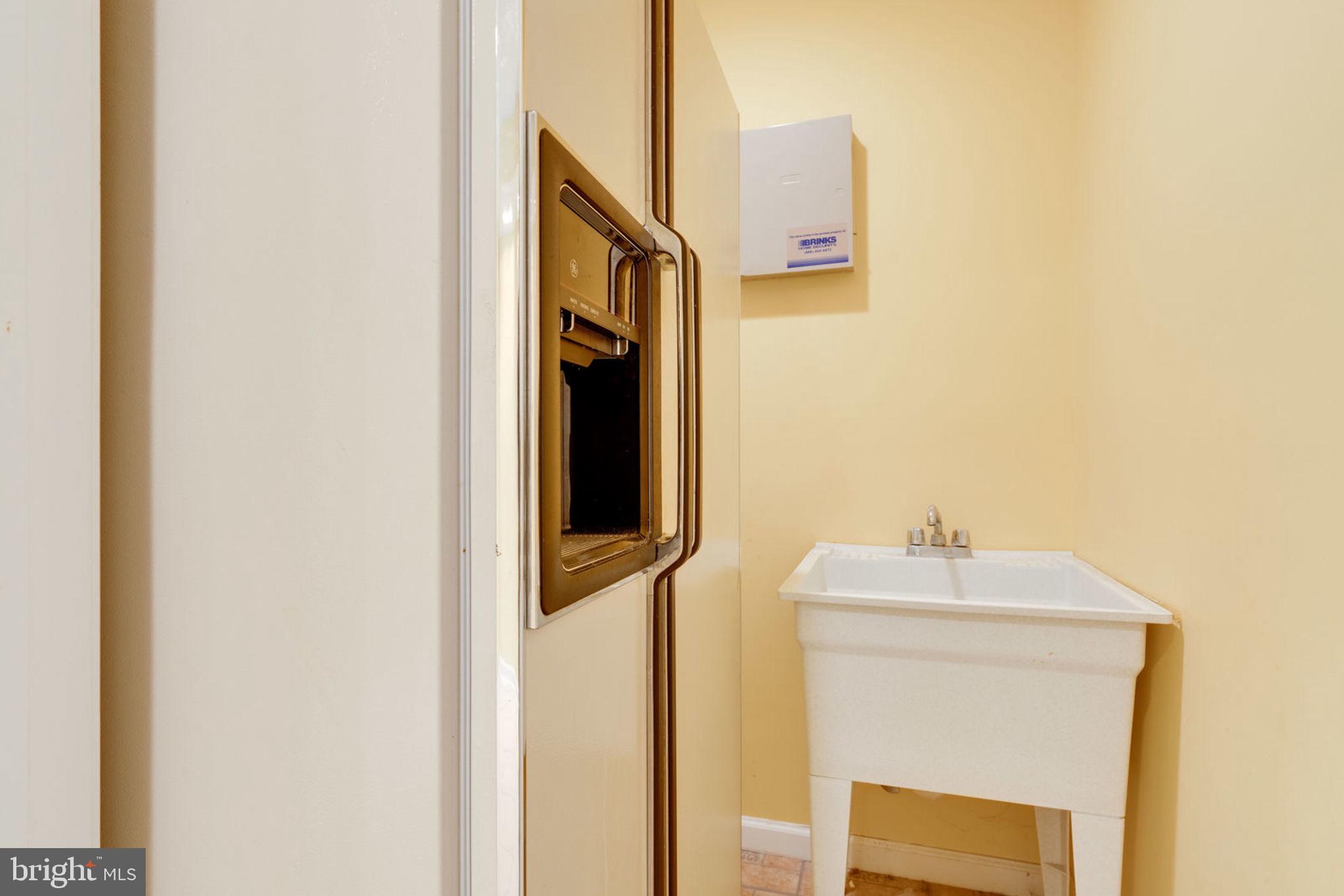 8111 Ridge Creek Way Springfield, VA 22153 - Photo 35 of 43 Lower Level Refrigerator and Utility Sink