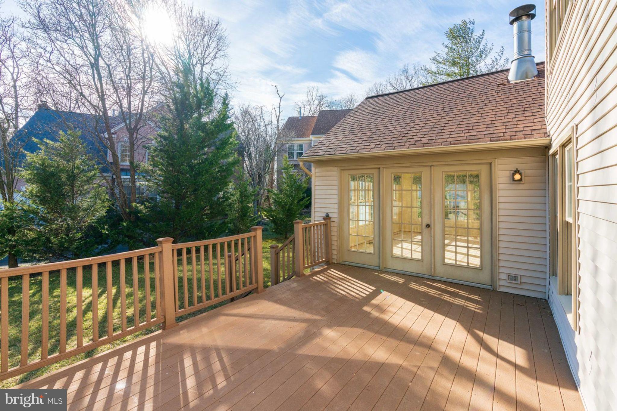 8111 Ridge Creek Way Springfield, VA 22153 - Photo 42 of 43 Large Trex Deck off of Sun Room