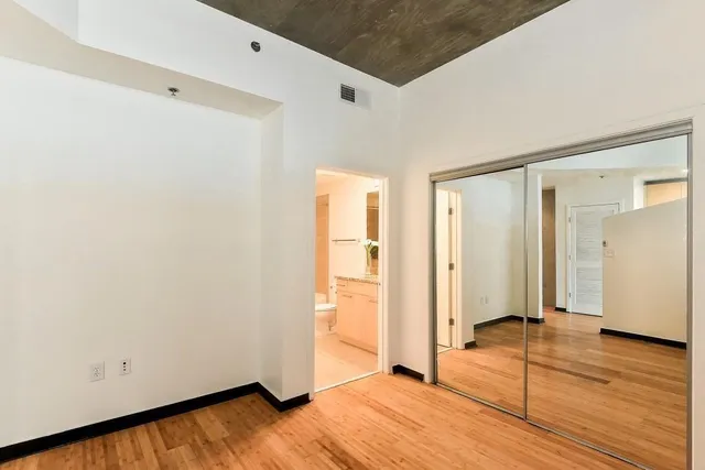 a view of a livingroom with wooden floor