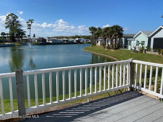 2120 Orbiter Court, Unit 166 Titusville, FL 32796 - Photo 14 of 46 lake view with deck