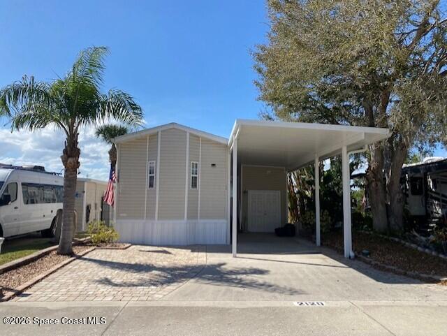 2120 Orbiter Court, Unit 166 Titusville, FL 32796 - Photo 3 of 46 front view no vehicle