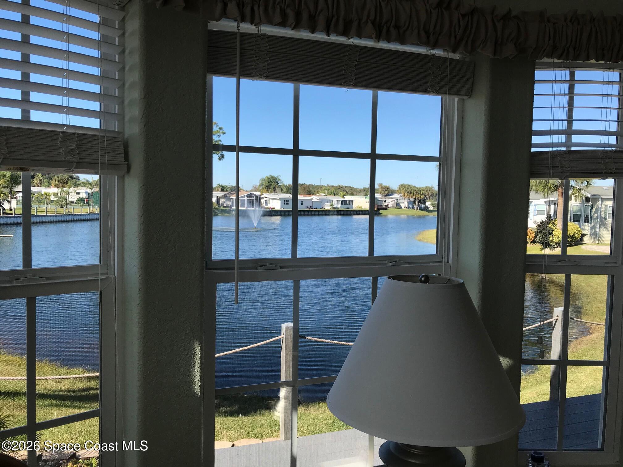 2120 Orbiter Court, Unit 166 Titusville, FL 32796 - Photo 38 of 46 window view of lake