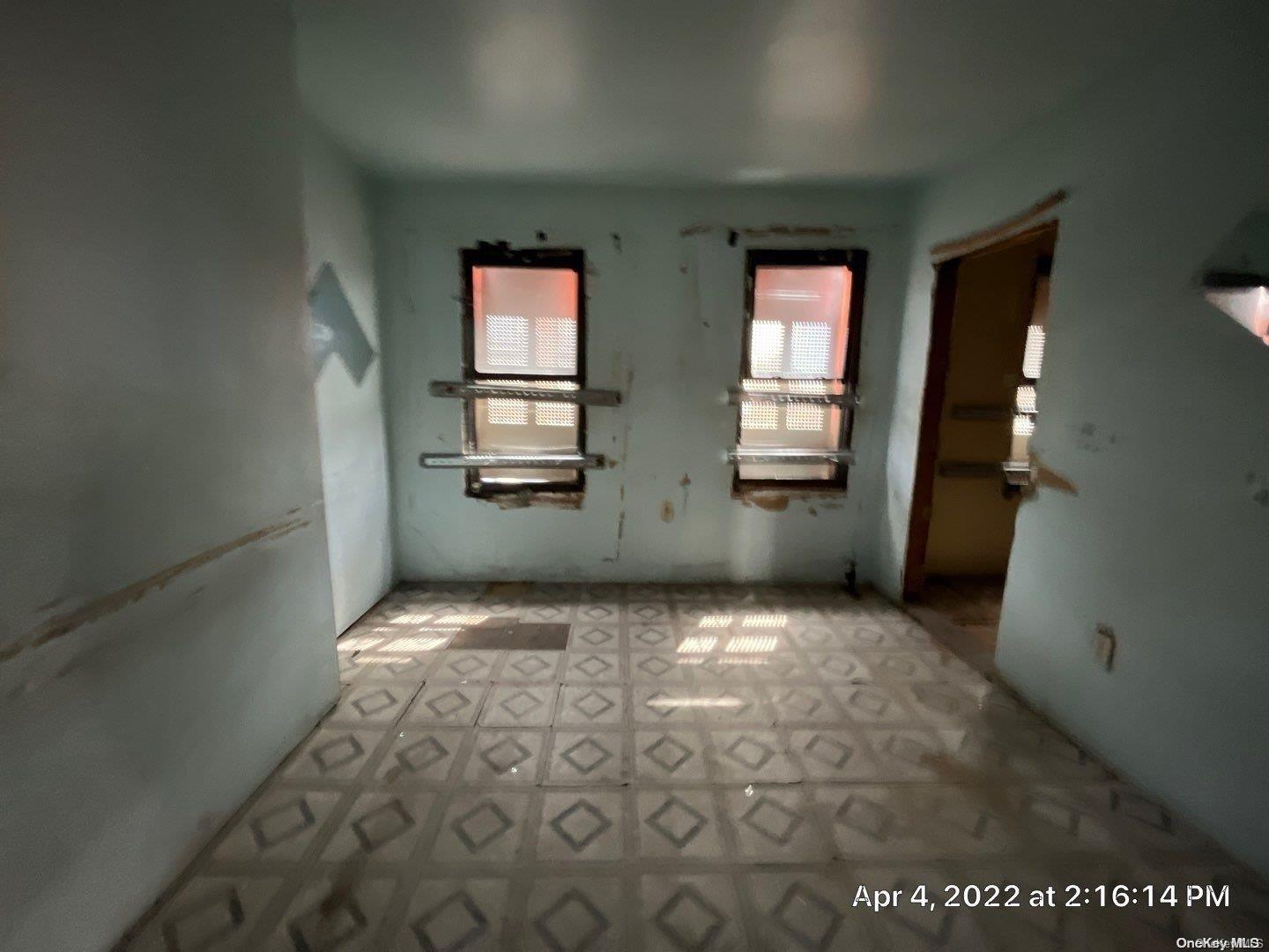 1737 Pacific Street Brooklyn, NY 11213 - Photo 4 of 5 an empty room with windows