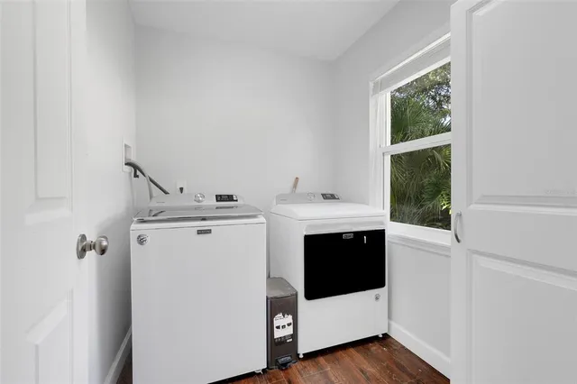 a utility room with washer and dryer