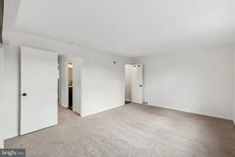 a bathroom with a toilet and a sink