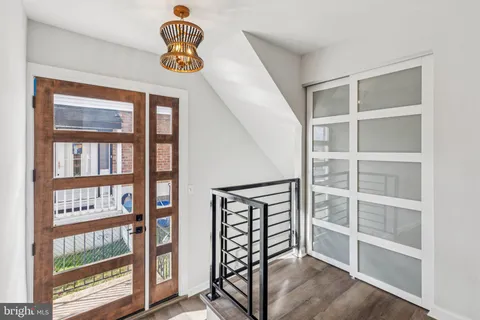 a view of front door with hallway