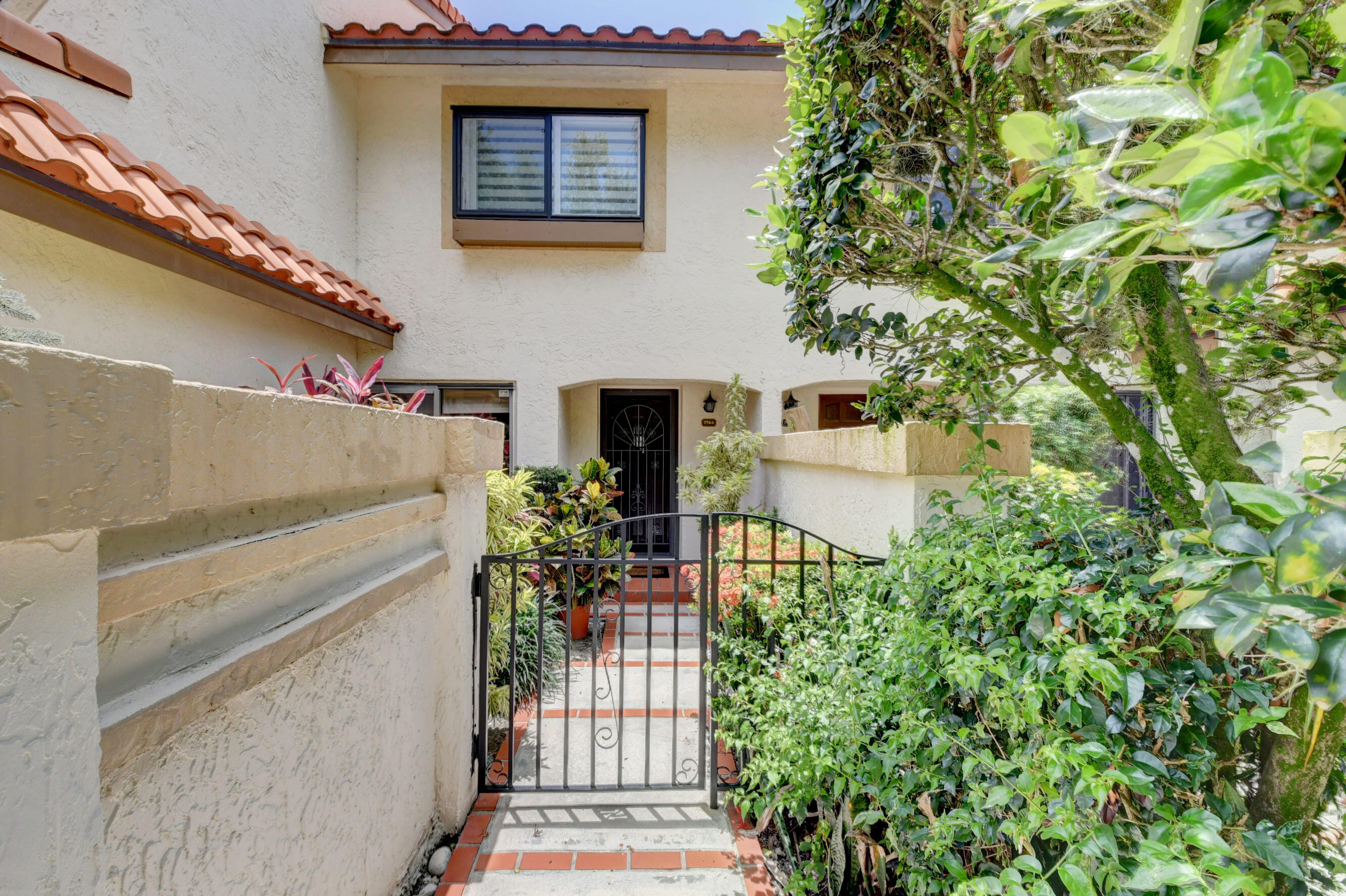 7744 La Mirada Drive Boca Raton, FL 33433 - Photo 2 of 32 front