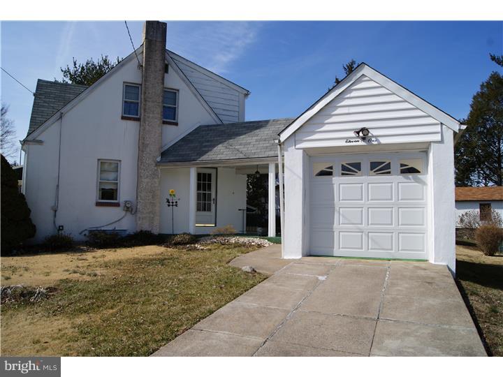 1101 East Darby Road Havertown, PA 19083 - Photo 2 of 20 a front view of a house with a yard