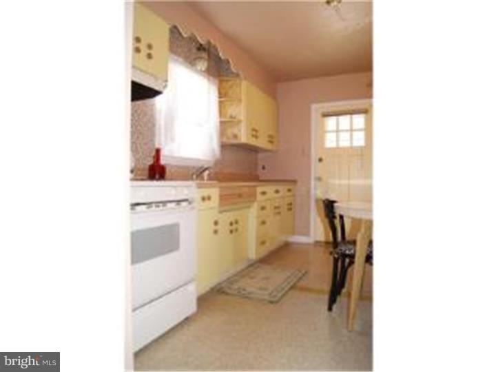 1101 East Darby Road Havertown, PA 19083 - Photo 11 of 20 a kitchen with a sink cabinets and window