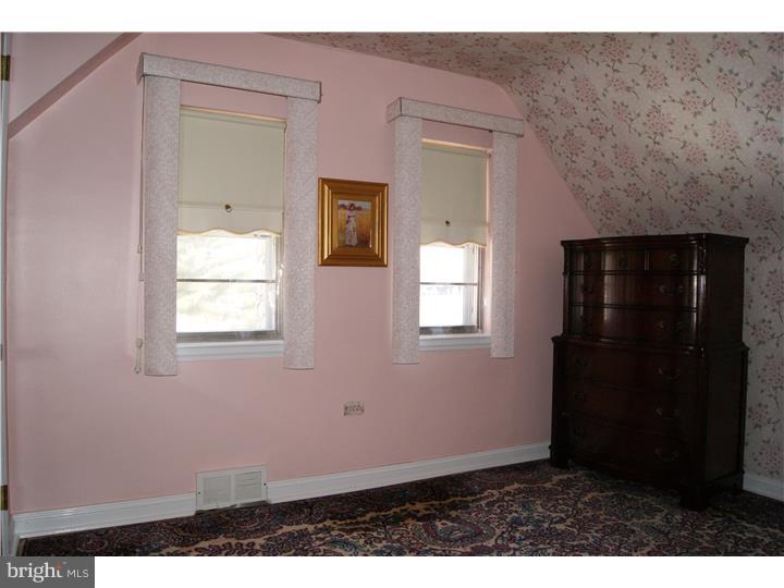 1101 East Darby Road Havertown, PA 19083 - Photo 17 of 20 a view of an empty room with window and closet area