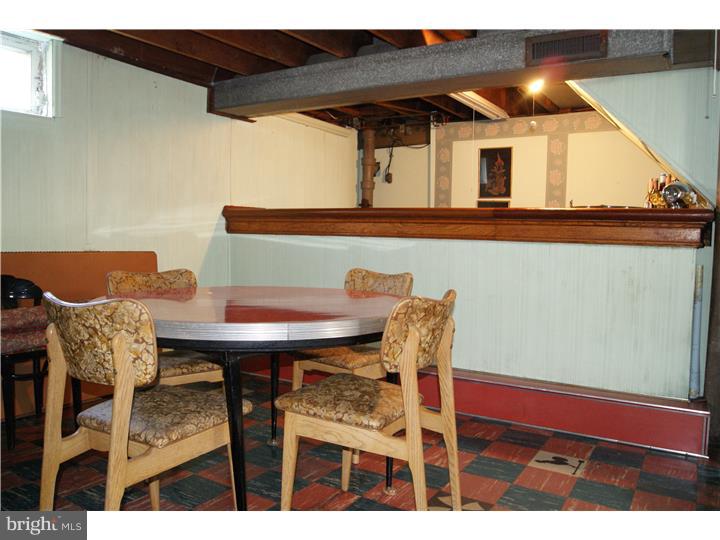 1101 East Darby Road Havertown, PA 19083 - Photo 20 of 20 a view of a dining room with furniture and chandelier