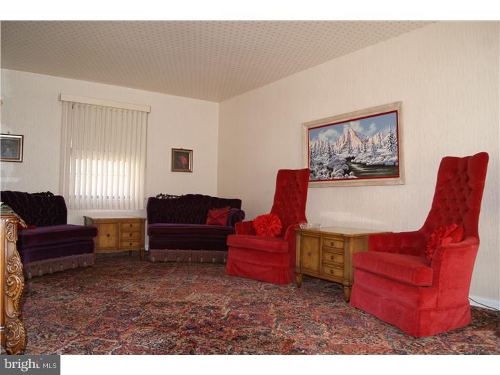 1101 East Darby Road Havertown, PA 19083 - Photo 7 of 20 a living room with furniture and a couch