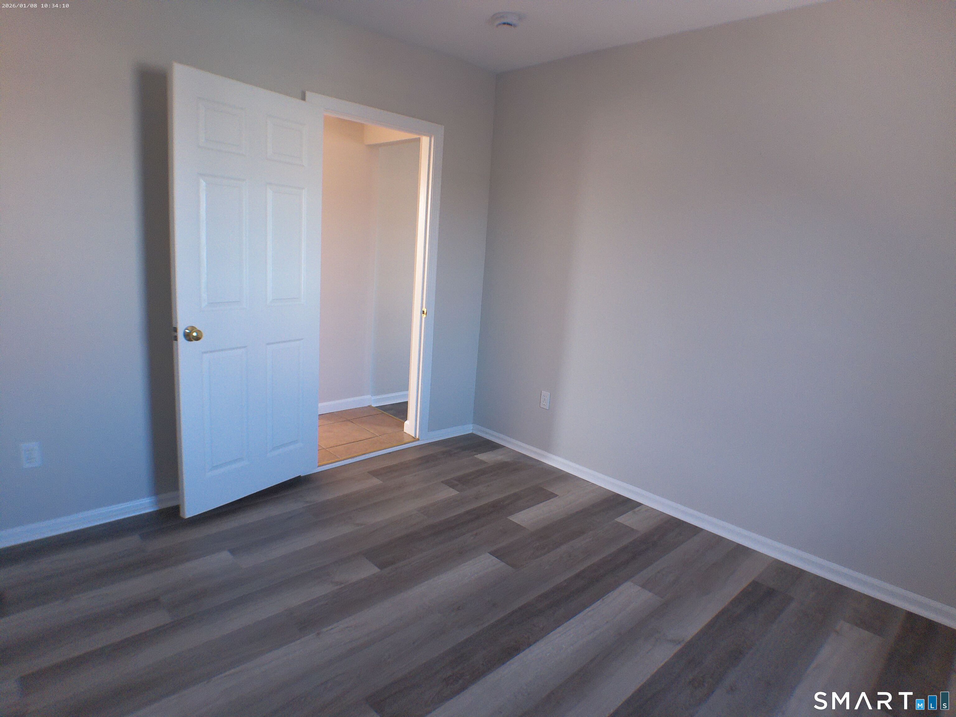 85 North Colony Street Wallingford, CT 06492 - Photo 20 of 35 a view of an empty room with wooden floor