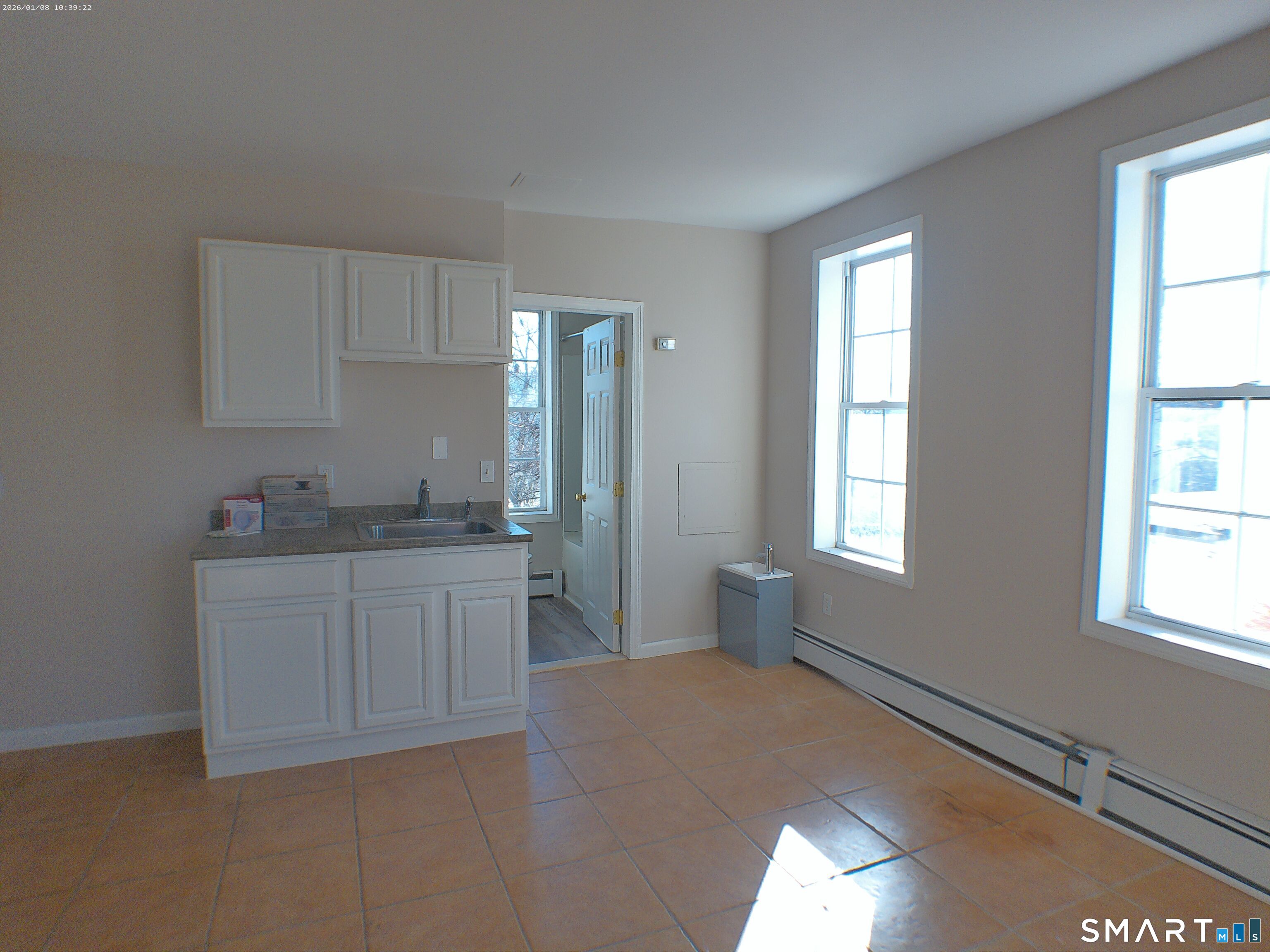 85 North Colony Street Wallingford, CT 06492 - Photo 30 of 35 a spacious bathroom with a tub sink and mirror