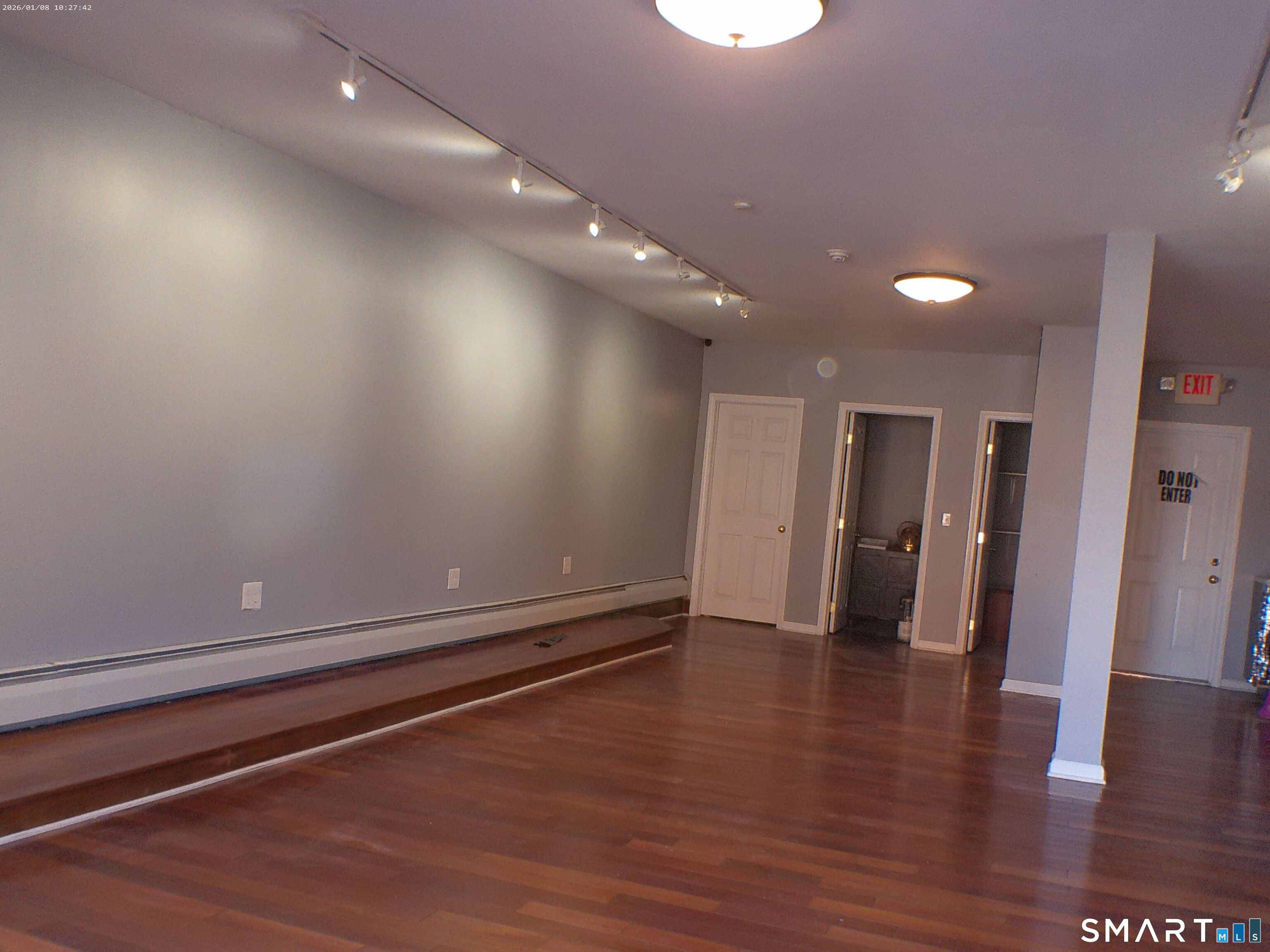 85 North Colony Street Wallingford, CT 06492 - Photo 3 of 35 a view of an empty room with wooden floor