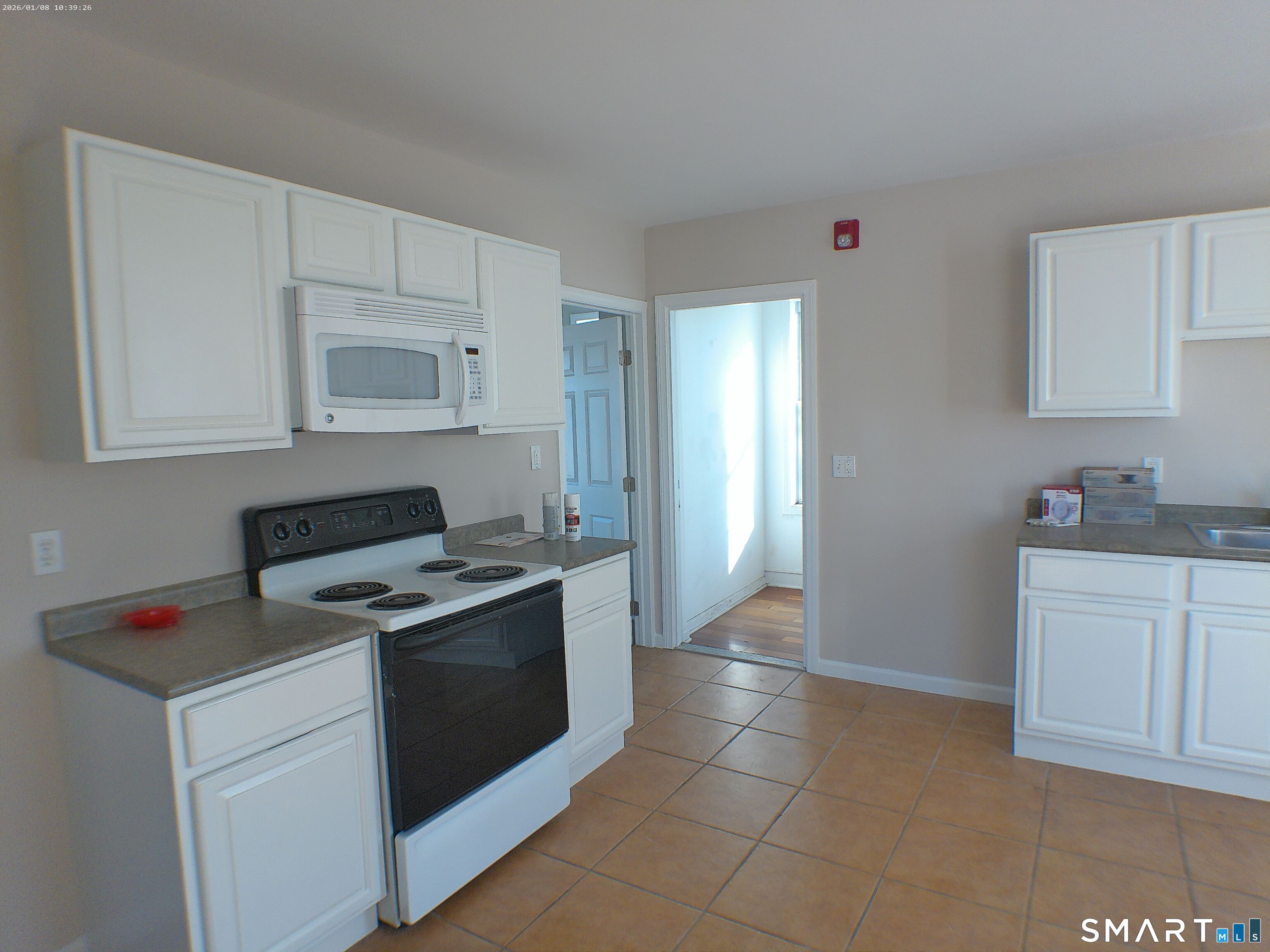 85 North Colony Street Wallingford, CT 06492 - Photo 31 of 35 a kitchen with stainless steel appliances granite countertop a stove a sink and a refrigerator