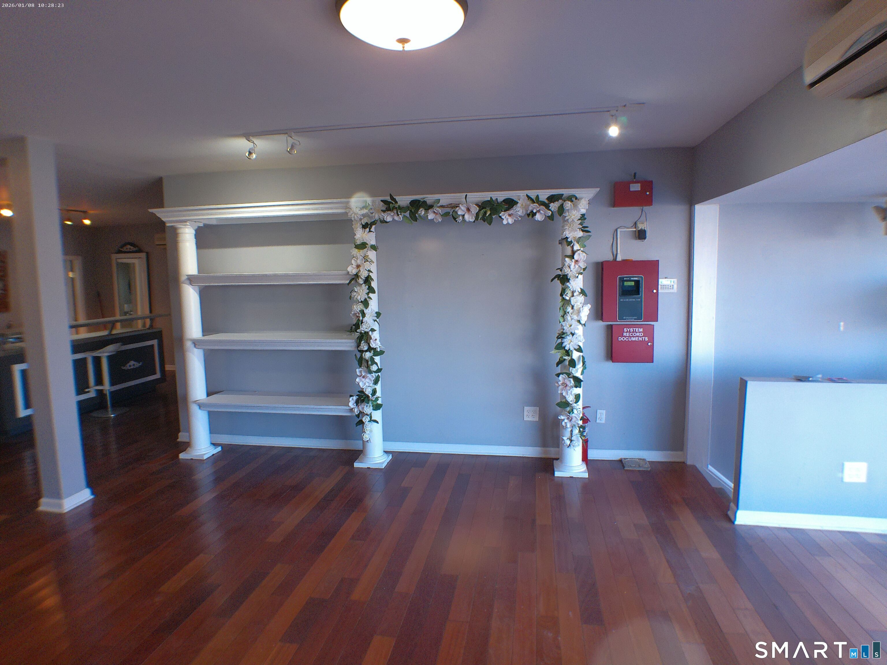 85 North Colony Street Wallingford, CT 06492 - Photo 5 of 35 a view of a room with wooden floor and window