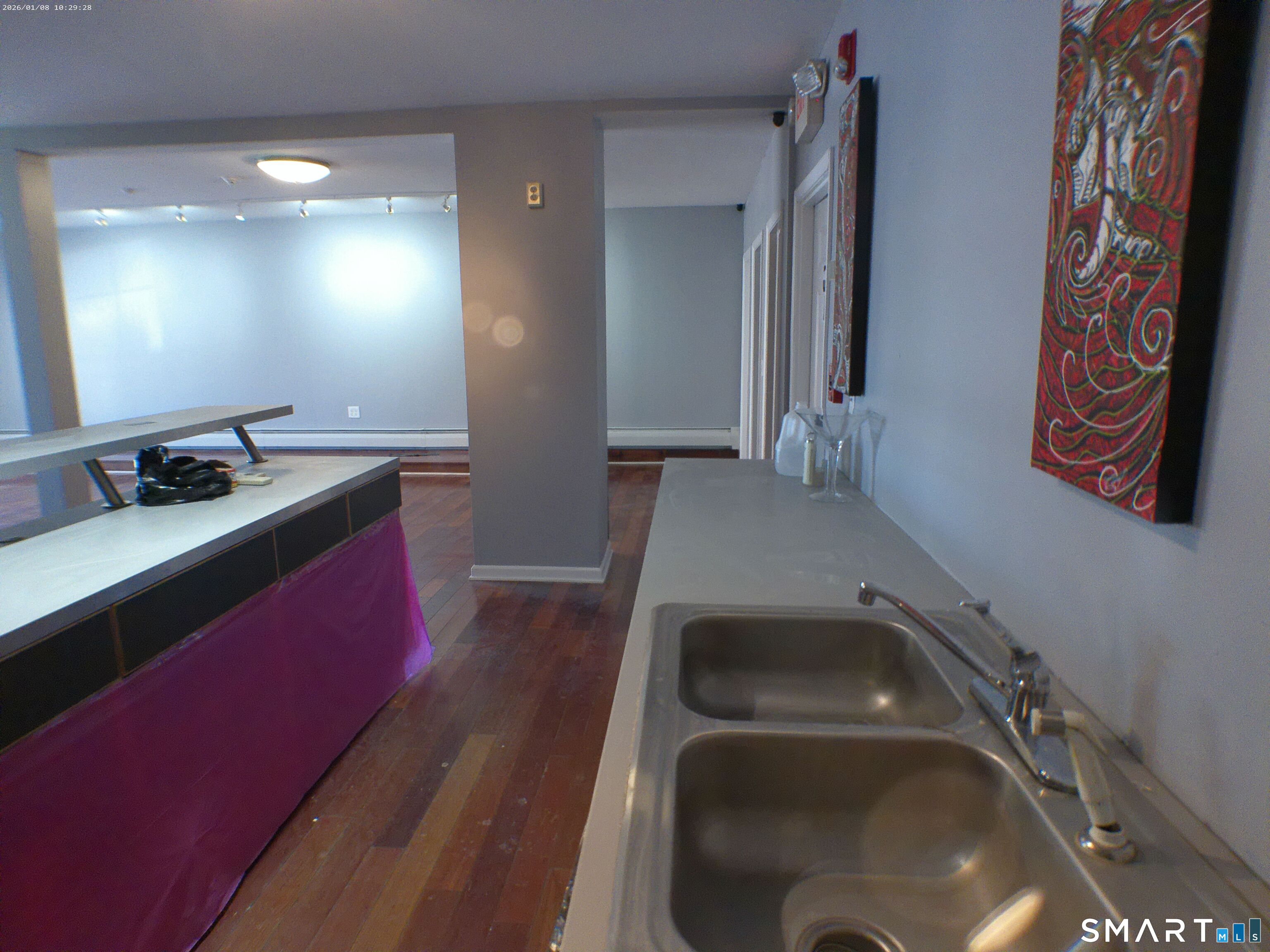 85 North Colony Street Wallingford, CT 06492 - Photo 9 of 35 a kitchen with a sink and a stove