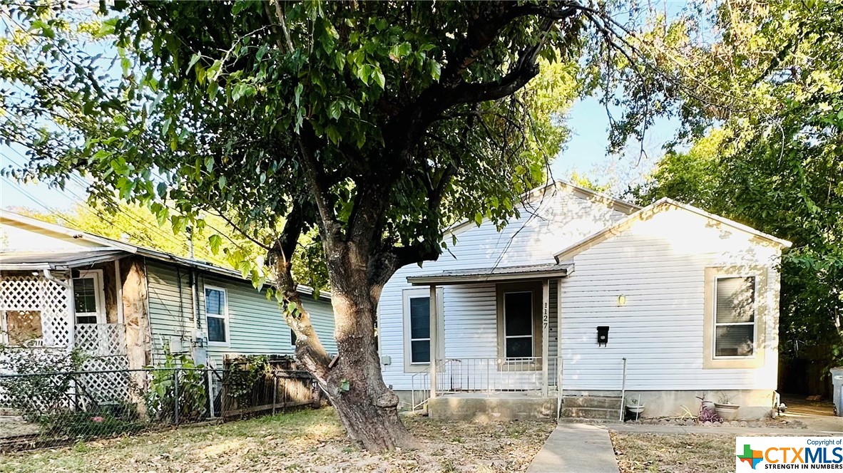 a view of a house with a patio