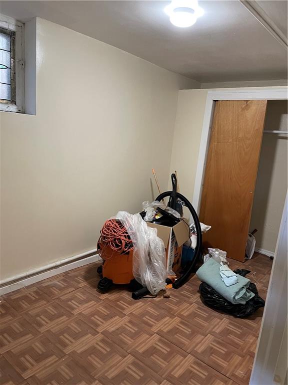 1423 Schenectady Avenue Brooklyn, NY 11203 - Photo 29 of 45 a bedroom with a bed and a window