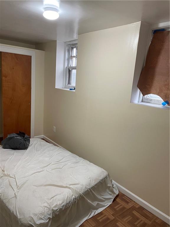 1423 Schenectady Avenue Brooklyn, NY 11203 - Photo 30 of 45 a bedroom with a bed and a window