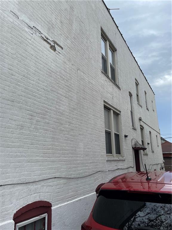 1423 Schenectady Avenue Brooklyn, NY 11203 - Photo 4 of 45 a lamp that is sitting in front of a building