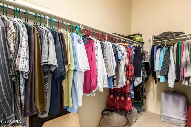 a view of a patio with table and chairs and potted plants