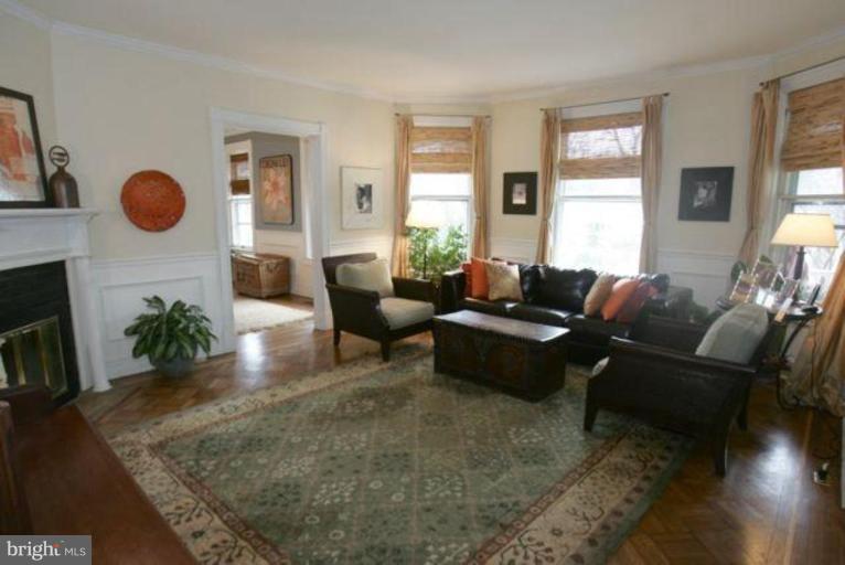 223 Hawthorn Road Baltimore, MD 21210 - Photo 2 of 30 a living room with furniture and a large window
