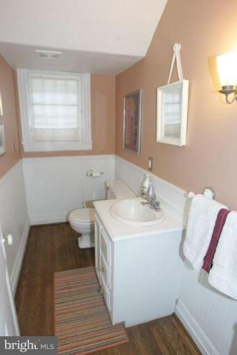 223 Hawthorn Road Baltimore, MD 21210 - Photo 13 of 30 a bathroom with a sink and a toilet