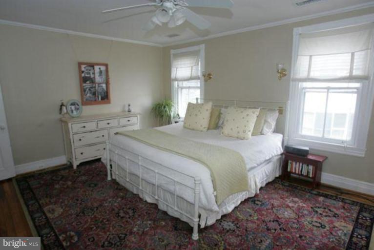223 Hawthorn Road Baltimore, MD 21210 - Photo 14 of 30 a bedroom with a bed and a window