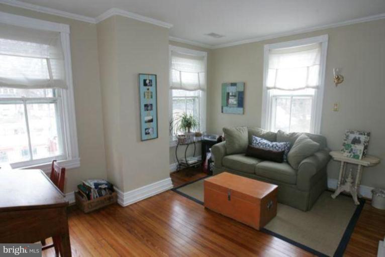 223 Hawthorn Road Baltimore, MD 21210 - Photo 16 of 30 a living room with furniture and a window