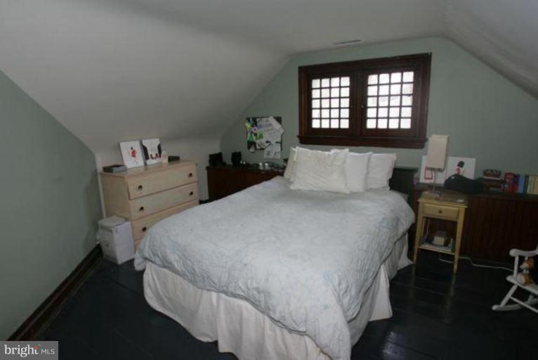 223 Hawthorn Road Baltimore, MD 21210 - Photo 21 of 30 a bedroom with a bed and a window