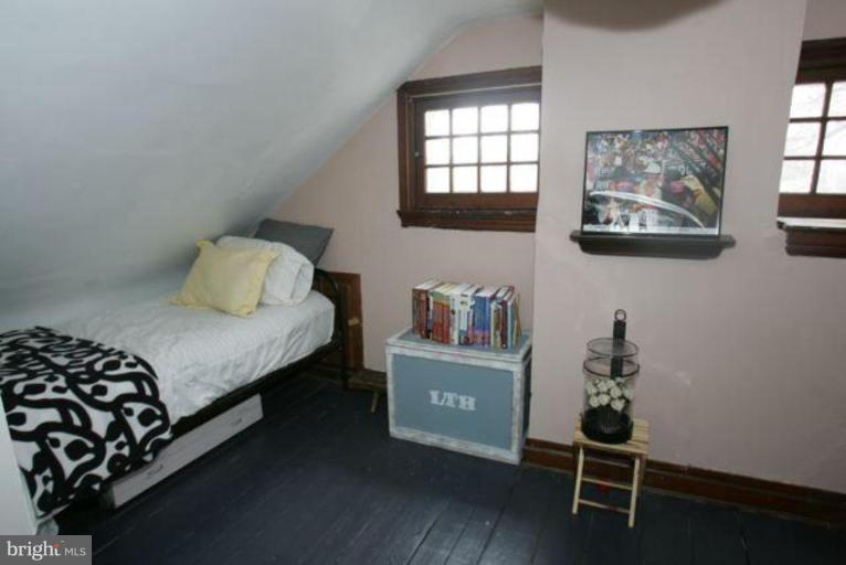223 Hawthorn Road Baltimore, MD 21210 - Photo 22 of 30 a bedroom with a bed and a window