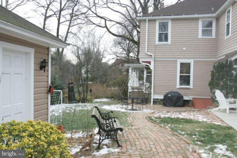 223 Hawthorn Road Baltimore, MD 21210 - Photo 28 of 30 a view of a patio with table and chairs and potted plants