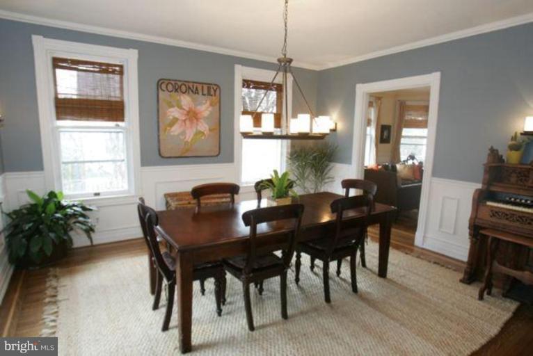 223 Hawthorn Road Baltimore, MD 21210 - Photo 4 of 30 a view of a dining room with furniture window and wooden floor