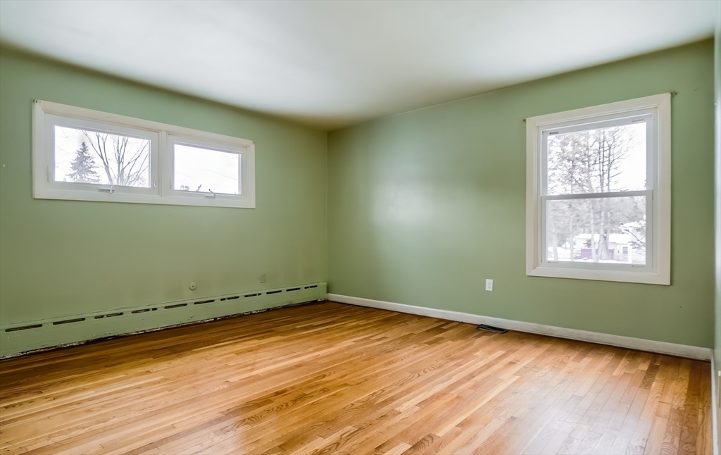9 Cloverleaf Road Leominster, MA 01453 - Photo 15 of 19 a view of a room with wooden floor and window