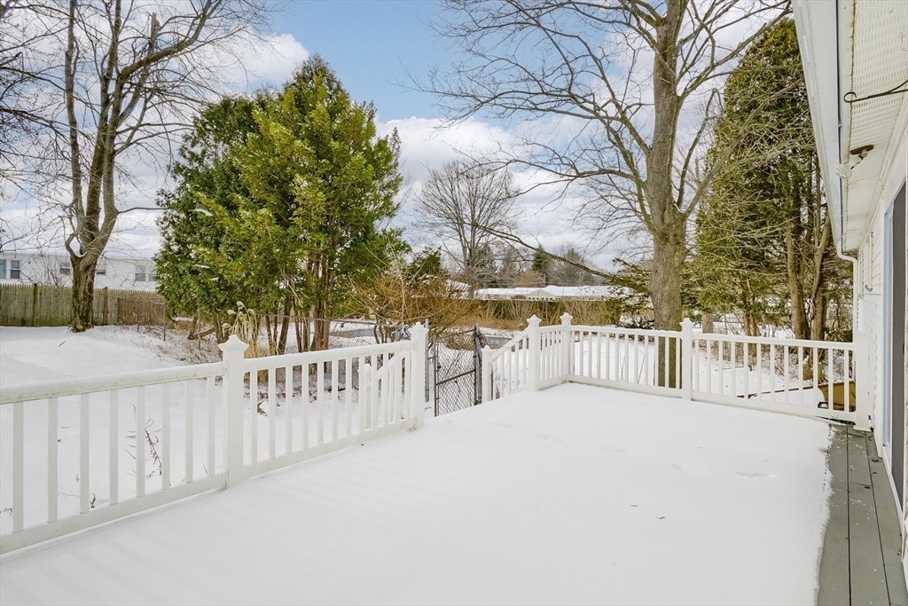9 Cloverleaf Road Leominster, MA 01453 - Photo 3 of 19 a view of a white house with a large trees