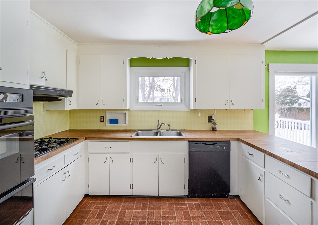 9 Cloverleaf Road Leominster, MA 01453 - Photo 6 of 19 a kitchen with a cabinets a sink and a stove