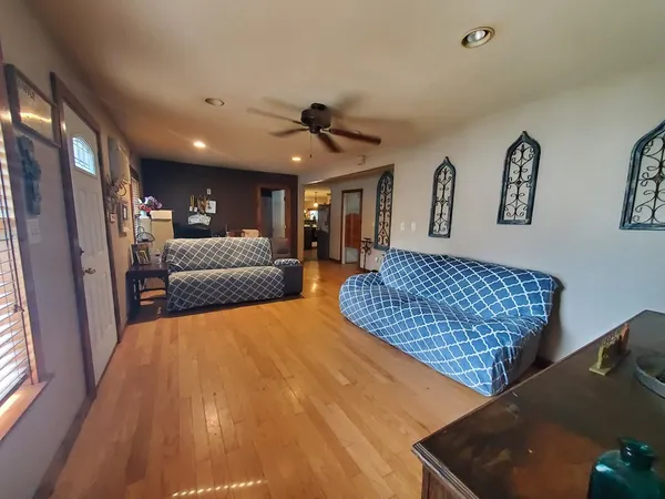 a living room with furniture and a rug